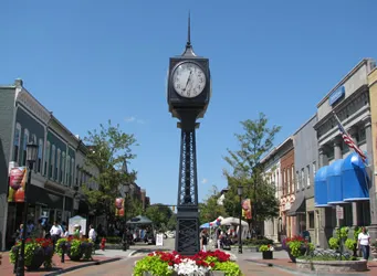 Clock tower and storefronts in downtown Northville, MI