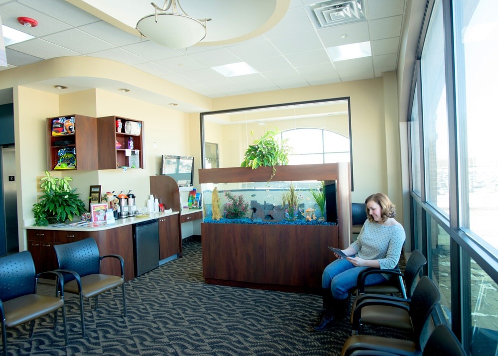 Masri Orthodontics waiting room with an aquarium